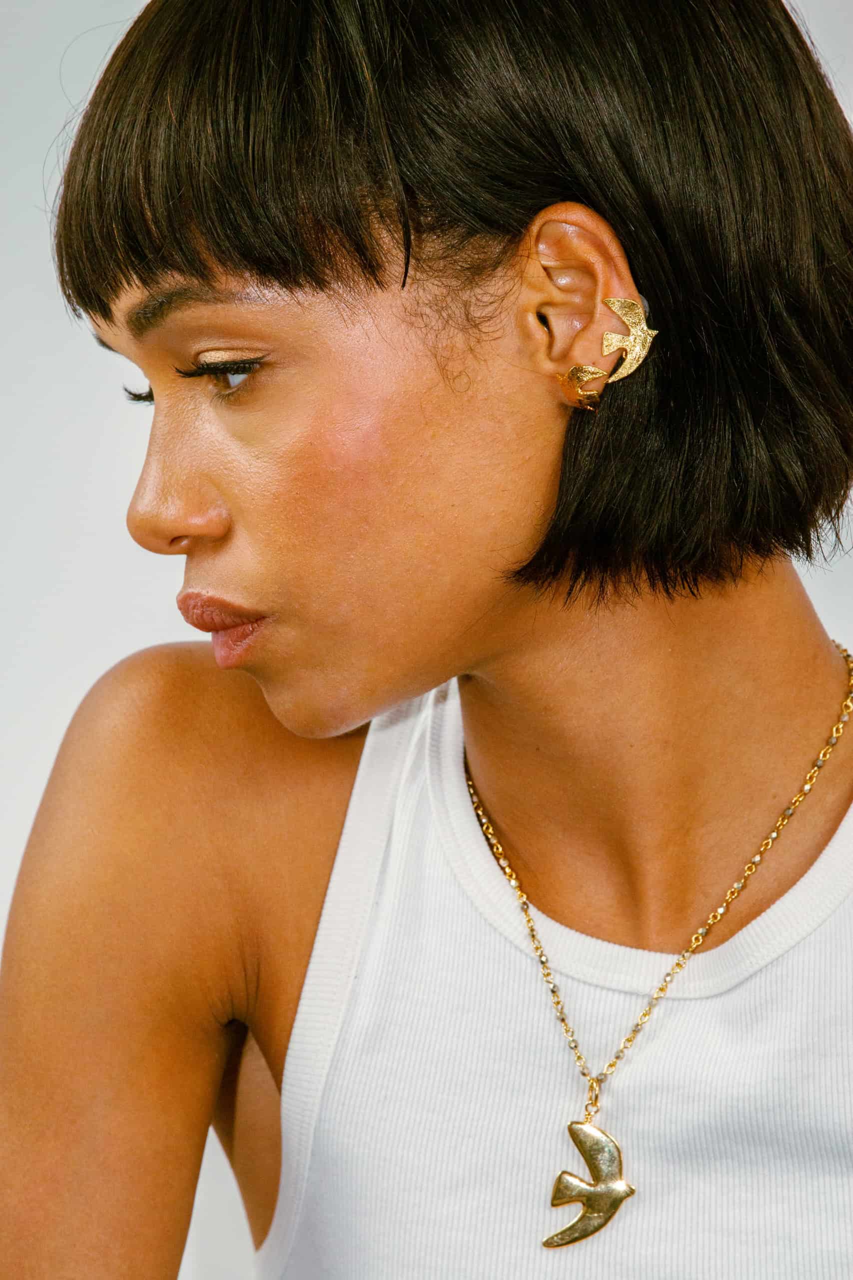 Photo portée Boucles D'oreilles Percée Doré Voyage