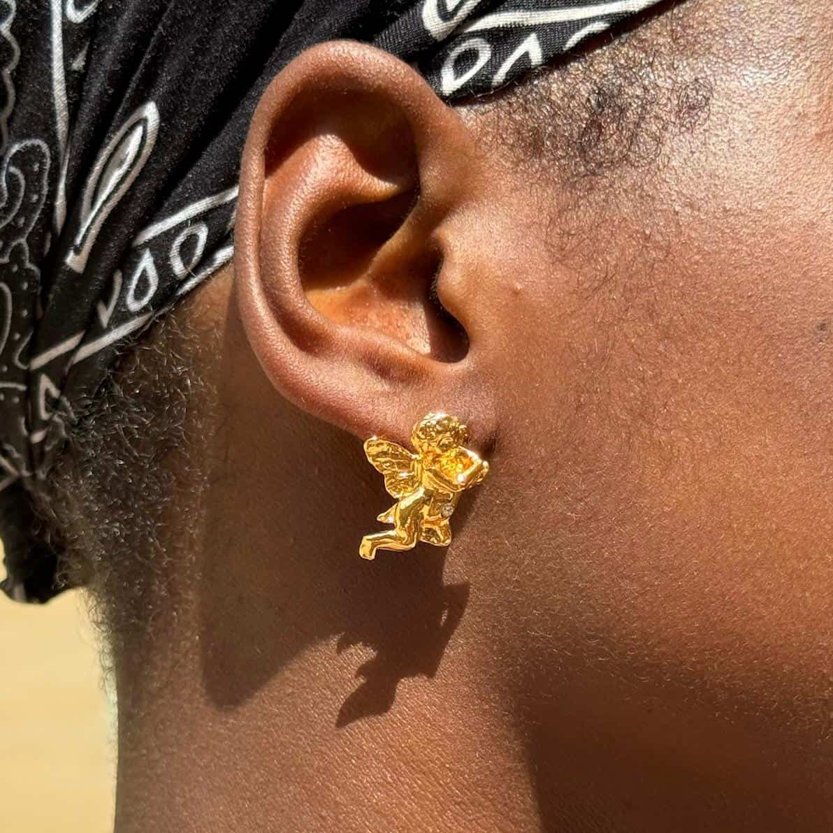 Photo portée Boucles D'oreilles Percée Doré Rencontre Imprévue
